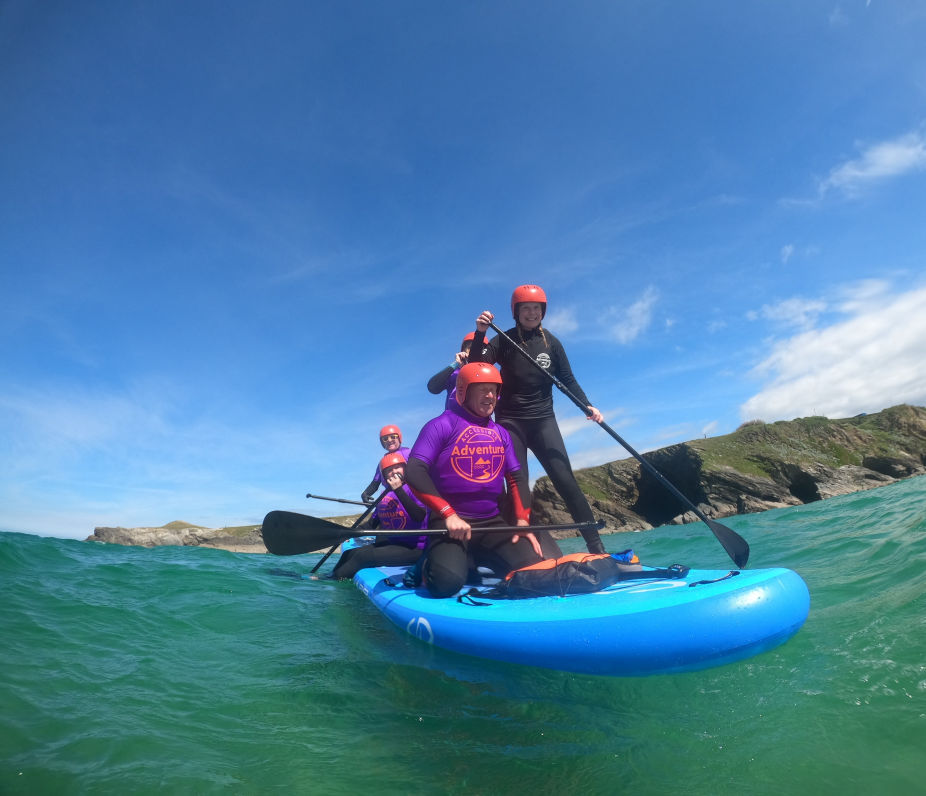 Group on a large paddleboard